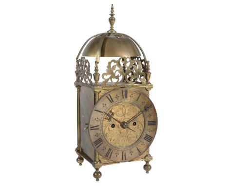 A Victorian brass lantern clock Unsigned, mid to late 19th century The five...   A Victorian brass lantern clock Unsigned, mi