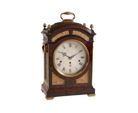 A fine George III brass mounted figured mahogany quarter chiming table clock...   A fine George III brass mounted figured mah