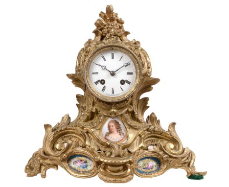 A French porcelain inset gilt brass mantel clock The movement by Raingo Freres   A French porcelain inset gilt brass mantel c