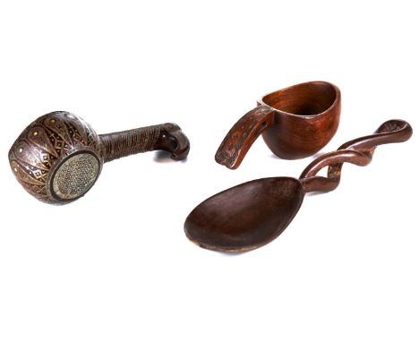 A 19TH CENTURY RUSSIAN WOODEN LADLE/KOVSCH inlaid with wire work, 7 3/4 ins long, an African wooden SPOON with twisted handle
