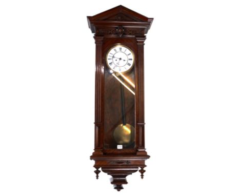 A LATE 19TH CENTURY WALNUT VIENNA REGULATOR WALL CLOCK, white enamel dial with twin weight movement retailed by Camerer Kuss,