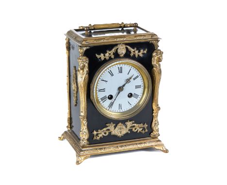 A 19TH CENTURY FRENCH EBONISED AND BRASS MOUNTED MANTEL CLOCK, white enamel dial with twin train tic-tac movement, the case w
