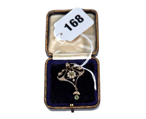 AN EDWARDIAN ART NOUVEAU 9CT GOLD SEED PEARL AND PERIDOT PENDANT, stamped 9c, approximately 3 grams.   £50-£75