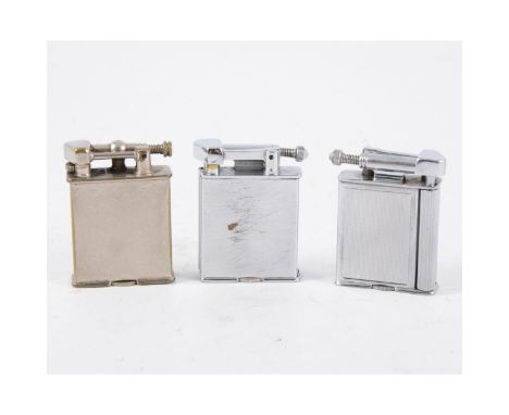 Three Parker petrol cigarette lighters, two "The Roller Beacon" models and "The Effective Lighter", (3).  