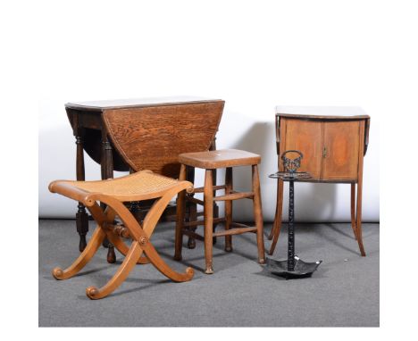 Modern metal stick stand; Edwardian inlaid mahogany cupboard, the shaped top with two drop-leaves, bowfront cupboard, splayed