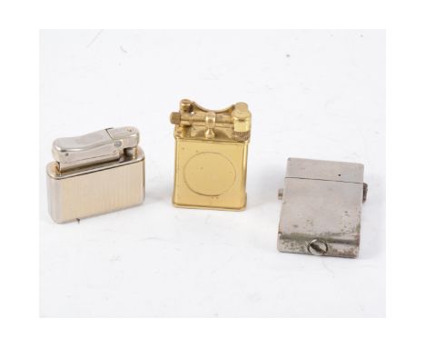 Early pocket cigarette lighters, including a hexaginal Art Deco lighter with Terrier dog design by Karl Wieden, another Karl 