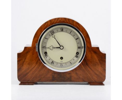 Walnut mantel clock, domed case, dome signed Elliott, the movement striking on four gongs.