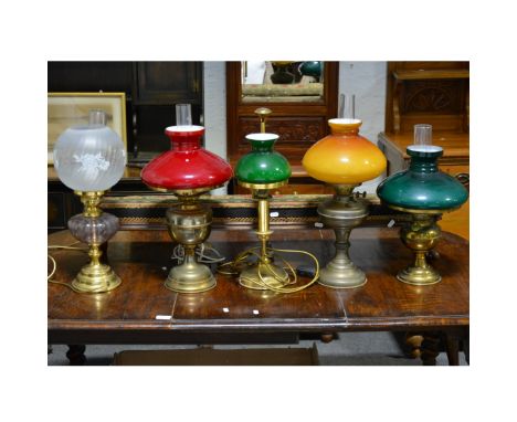 Brass oil lamp, with chimney and shade, 56cm; and four other lamps. (5)