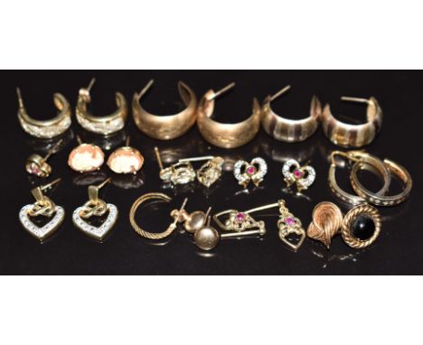 Nine pairs of 9ct gold earrings including cameo, diamond, ruby and diamonds, hoops, etc and six single 9ct gold earrings, 22.