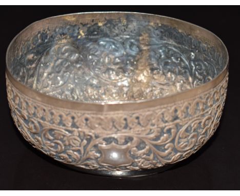 Indian or Burmese silver bowl with embossed foliate decoration and fish scale design to base, length 10.5cm, weight 107g