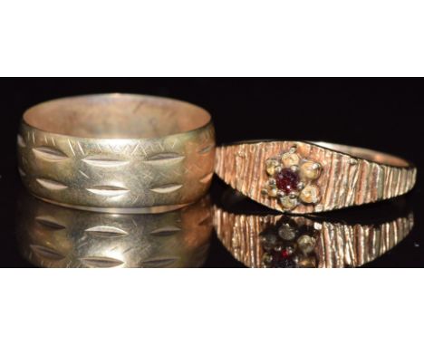 A 9ct gold ring and a 9ct gold ring set with a garnet and paste, 4.5g, size Q
