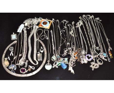 Thirty six silver pendants/ necklaces including abalone, quartz, amber, Greek key, mother of pearl, etc&nbsp;
