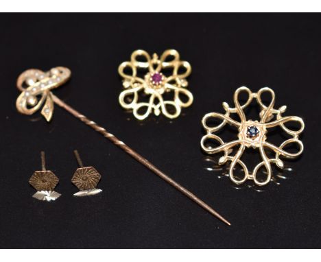 A 15ct gold Art Nouveau stick pin in the form of a shamrock set with seed pearls (1.7g), two&nbsp;9ct gold brooches, one set 