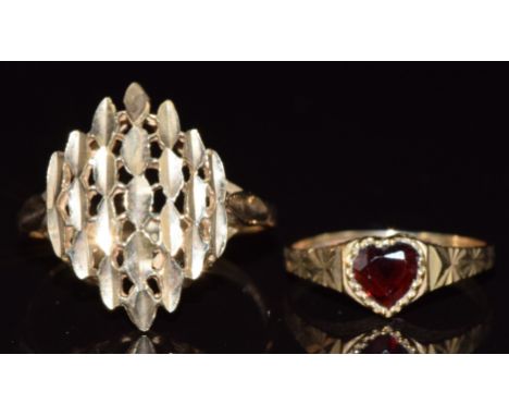 A 9ct gold ring with marquise shaped design (1.9g, size P) and a 9ct gold ring set with a heart cut garnet, 1.1g, size F