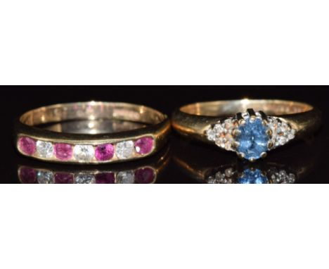 Two 9ct gold rings, one set with a sapphire and diamonds the other rubies and cubic zirconia, 3.8g, sizes K &amp; O
