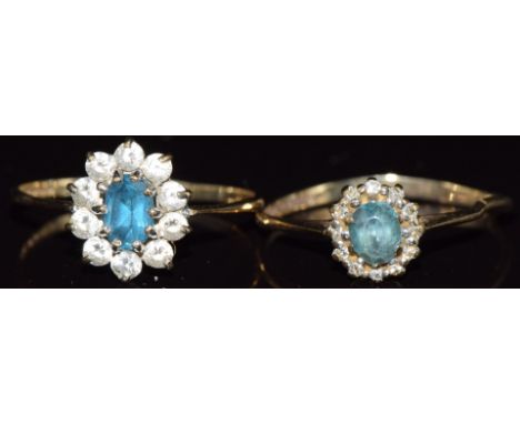 Two 9ct gold rings one set with topaz the other with topaz and diamonds, 2.7g, size R