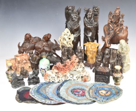 A pair of Chinese hardwood figures with inlaid silver wire, a pair of Chinese carved hardwood water buffalo, a pair of Chines