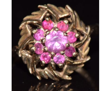 A 9ct gold ring set with rubies, 3.4g, size O