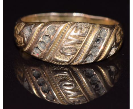 A 15ct gold ring reading 'LOVE', Birmingham 1884, 1.5g, size K