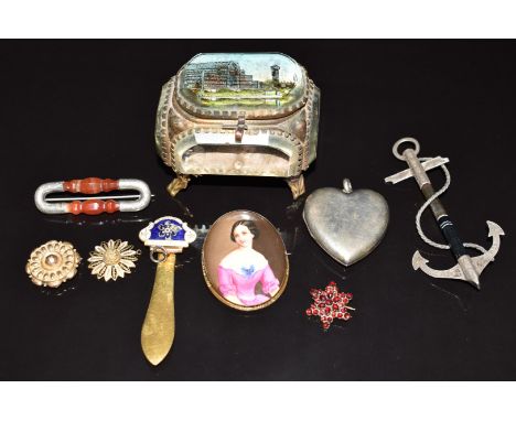 Victorian brooches including a silver example in the form of an anchor set with agate, another agate, Bohemian cut garnet set