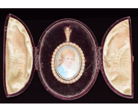 Georgian pendant set with an ivory portrait miniature depicting a young boy, signed, within a border of split pearls, verso e