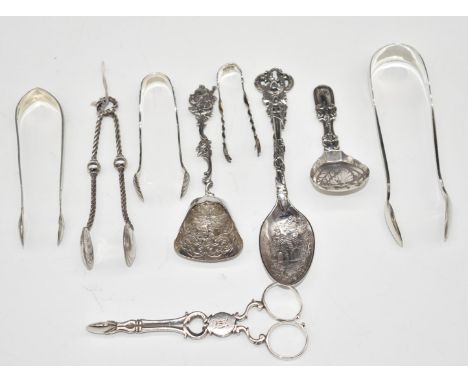 Five pairs of Georgian and later sugar tongs and nips, Georgian hallmarked silver caddy spoon, Birmingham 1819, maker&nbsp;Jo