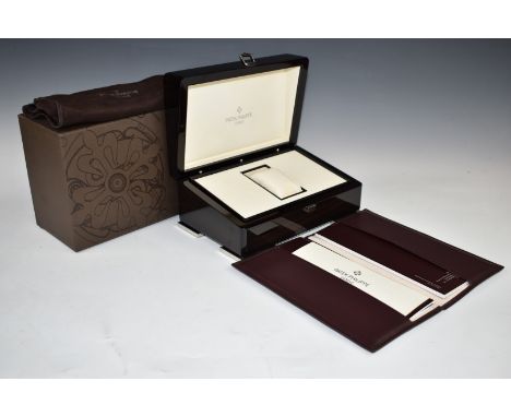 Patek Philippe Calatrava wristwatch box with fitted interior, certificate, related paperwork, fabric cover and outer box.&nbs