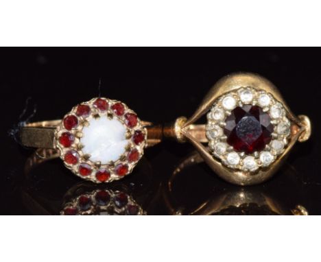 Two 9ct gold rings set with garnets, 5.5g, size M &amp; K