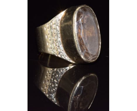 A 1970's 9ct gold ring set with smoky quartz, 9.2g, size R