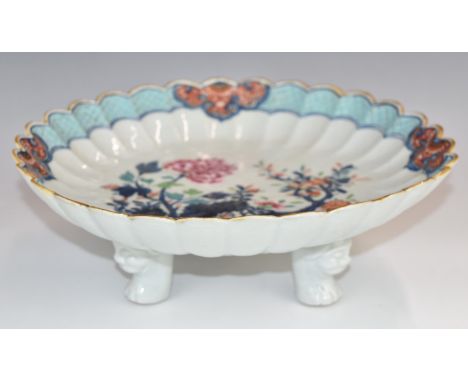 Japanese Meiji period dish raised on three figural legs, D10 x H28cm
