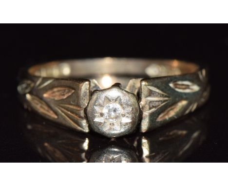 A 9ct gold ring set with a diamond, 2.6g, size K