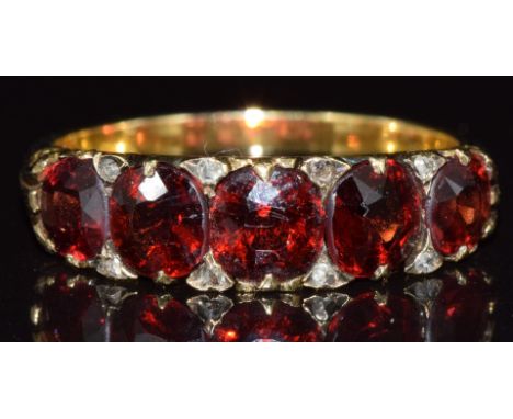 Victorian ring set with garnets and rose cut diamonds, 3.8g, size O