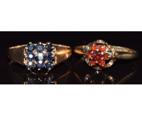 A 9ct gold ring set with garnets and a&nbsp;9ct gold ring set with sapphires, 3.8g, size Q