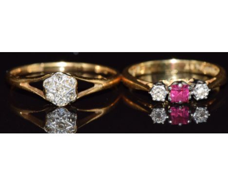 Two 18ct gold rings, one set with a ruby and diamonds the other Art Deco and set with diamonds, 3.8g, size O &amp; H