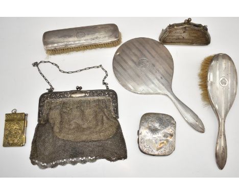 Hallmarked silver dressing table set comprising hand mirror and two brushes, cigarette case, weight 91g, small notepad cover 