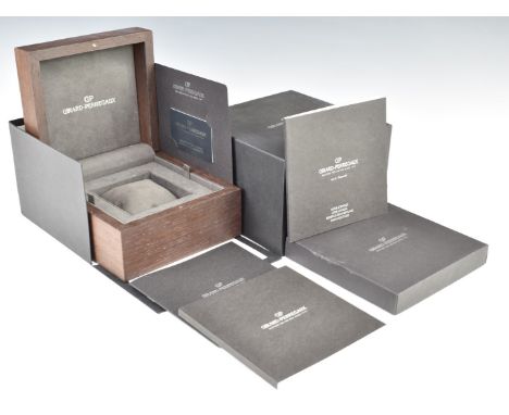 Girard-Perregaux WWTC World Time Chronograph wristwatch box with related paperwork, international guarantee card and watch pu