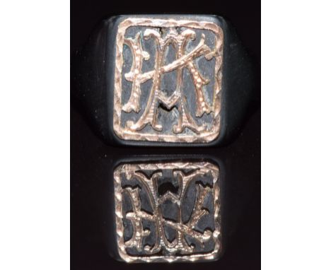 A jet signet ring with gold initials, size H&nbsp;