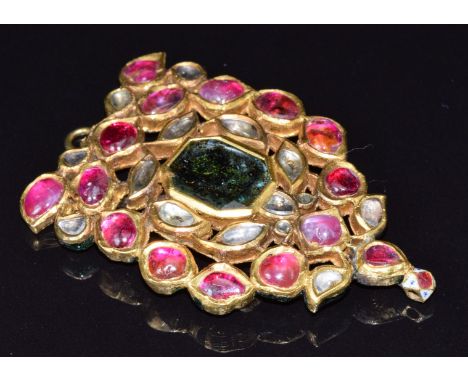 Indian yellow metal pendant set with foiled rubies, diamonds and a quartz with enamel decoration to the back, 31.4g, 5 x 3.5c