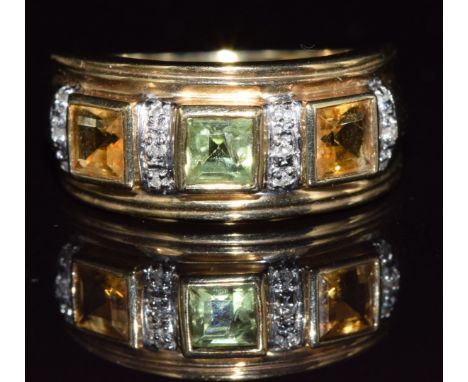 A 9ct gold ring set with peridot, citrine and diamonds, 4.5g, size M/N