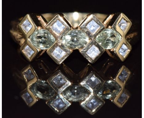 A 9ct gold ring set with topaz and sapphires, 2.9g, size N