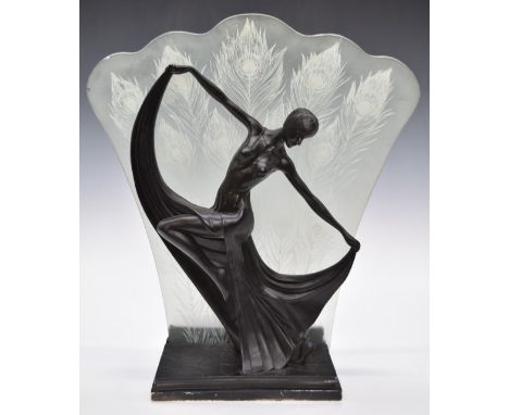 Art Deco style figural lamp with glass panel decorated with peacock feathers behind, W38 x H39cm