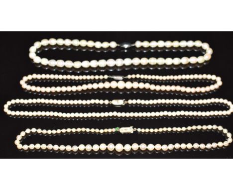 Two single strands of cultured pearls with 9ct gold clasps and two pearl necklaces with silver clasps