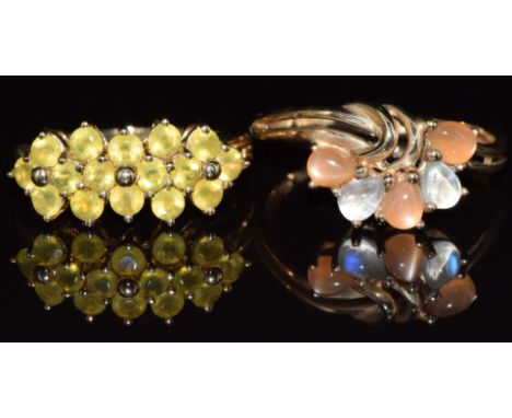 A 9ct gold ring set with moonstones and a 9ct gold ring set with paste, 4.3g, sizes N &amp; J