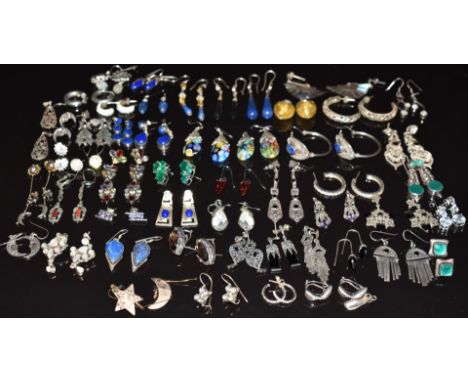 Fifty pairs of silver earrings including abalone, lapis lazuli, mother of pearl, etc