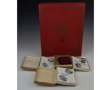 The Kings and Queens of England first edition sterling silver proof 43 coin set in an album with information cards, each coin