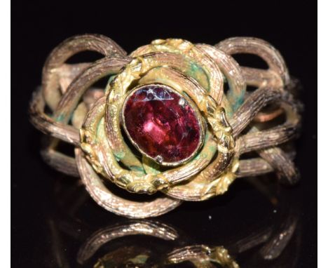 A 9ct gold ring set with a foiled garnet in a knotted textured setting, 5.5g, size N