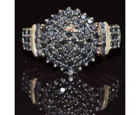 A 9ct gold ring set with approximately 1ct of black diamonds in a cluster, 4.1g, size K
