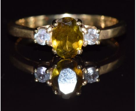A 9ct gold ring set with quartz and tourmaline, 2.4g, size N