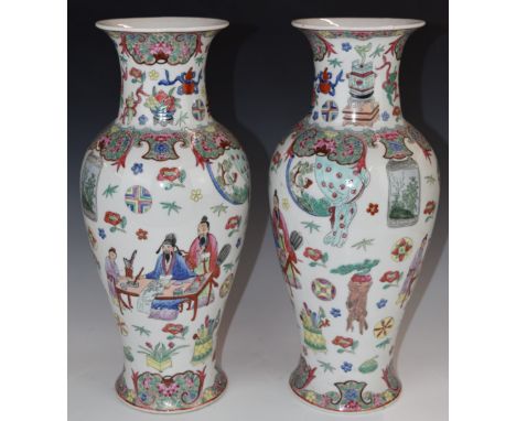 Pair of 20thC Chinese vases of baluster form decorated with figural scenes, flowers and foliage, with seal mark to base, H41c