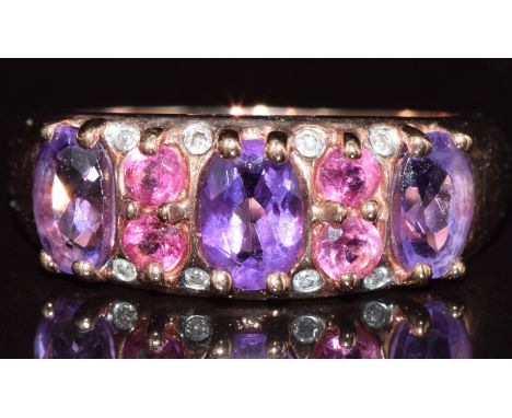 A 9ct rose gold ring set with amethysts, tourmaline and diamonds, 3g, size N